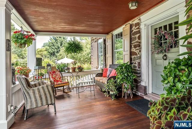 2 Wierimus Ln, Hillsdale, NJ 07642 - sunroom / solarium with wooden ceiling and wood finished floors