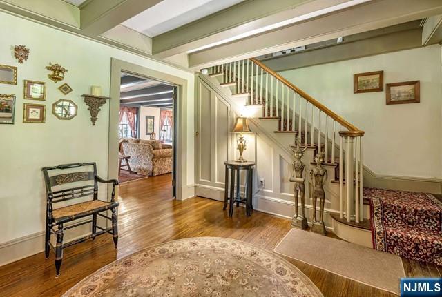 2 Wierimus Ln, Hillsdale, NJ 07642 - stairway featuring baseboards and wood finished floors