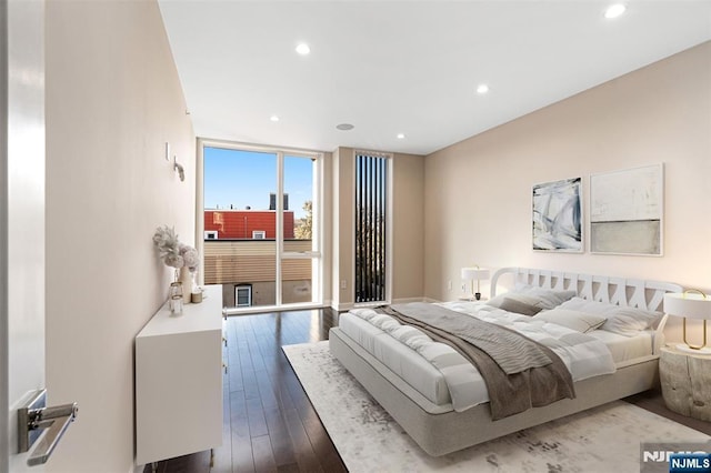 5-05 Washington Pl Unit 5-05, Cliffside Park, NJ 07010 - bedroom featuring recessed lighting, dark wood-style flooring, and expansive windows