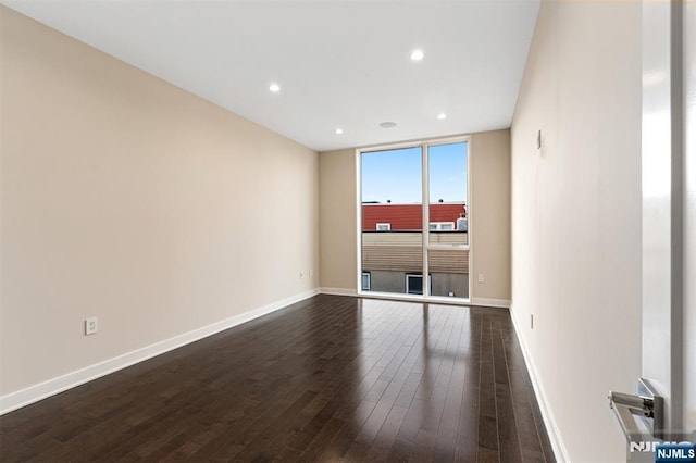 5-05 Washington Pl Unit 5-05, Cliffside Park, NJ 07010 - unfurnished room featuring recessed lighting, baseboards, and dark wood-style floors