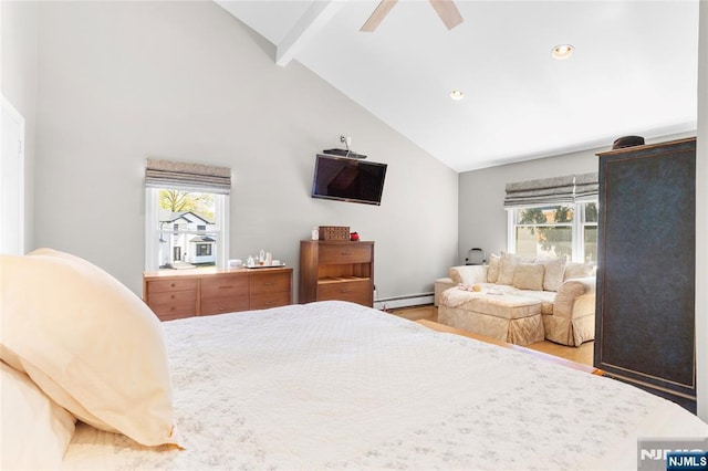 bedroom featuring wood finished floors, a baseboard radiator, beam ceiling, and multiple windows