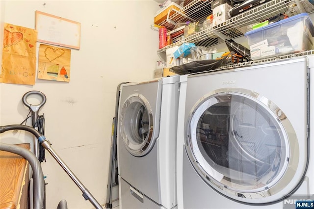 laundry area featuring laundry area and washer / dryer