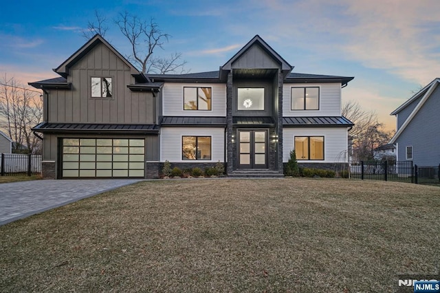 131 Winslow Ter, Glen Rock, NJ 07452 - view of front of home featuring fence, board and batten siding, and a standing seam roof