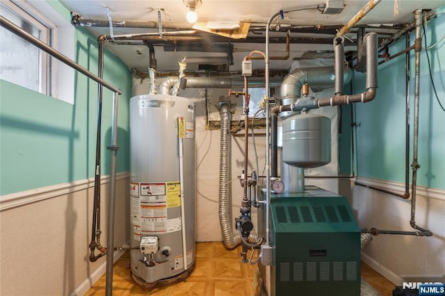 utilities featuring a heating unit and water heater