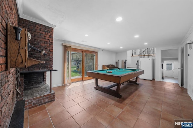 rec room with crown molding, recessed lighting, and tile patterned flooring