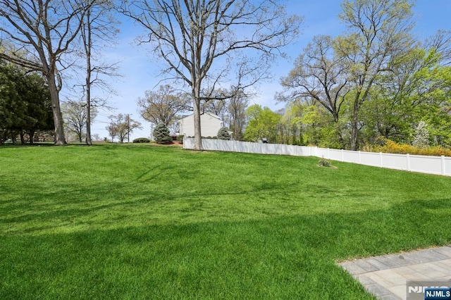 view of yard featuring fence