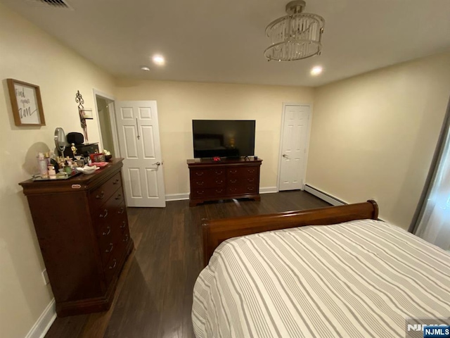 66 Lexington Ave, Rochelle Park, NJ 07662 - bedroom featuring recessed lighting, wood finished floors, baseboards, and a baseboard heating unit