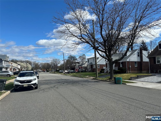 66 Lexington Ave, Rochelle Park, NJ 07662 - view of street with curbs, sidewalks, and a residential view