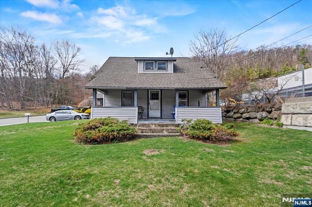 7 White Rd, West Milford, NJ 07421 - bungalow with roof with shingles, covered porch, and a front lawn