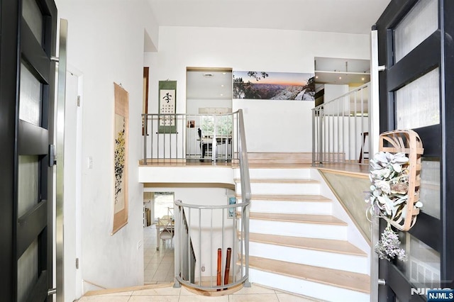 interior space featuring tile patterned flooring and a wealth of natural light