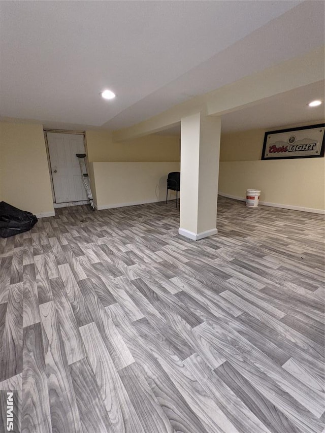 finished basement with recessed lighting and baseboards