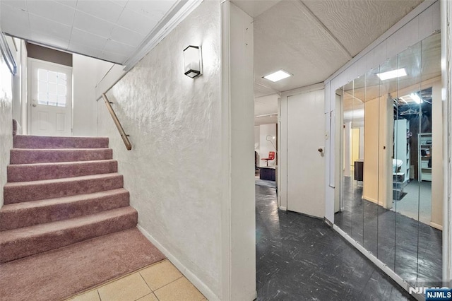 98 Roosevelt Blvd, Oakland, NJ 07436 - stairway with baseboards and a textured wall