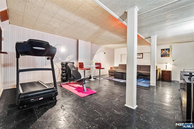 98 Roosevelt Blvd, Oakland, NJ 07436 - workout area with tile patterned floors and wallpapered walls