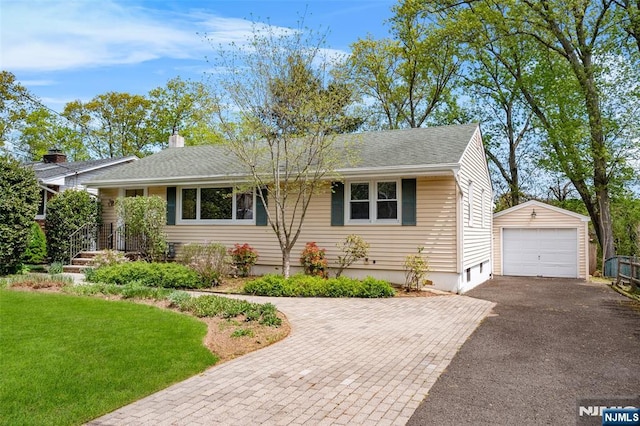98 Roosevelt Blvd, Oakland, NJ 07436 - view of front of house with a garage, aphalt driveway, an outbuilding, and a front yard