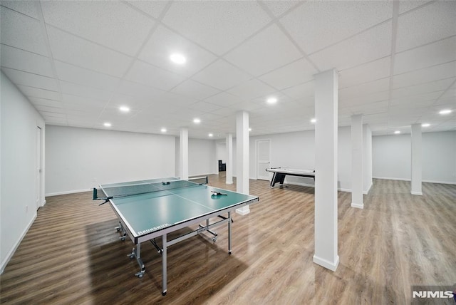 143 S Glen Rd, Kinnelon Borough, NJ 07405 - playroom featuring baseboards, a drop ceiling, and wood finished floors