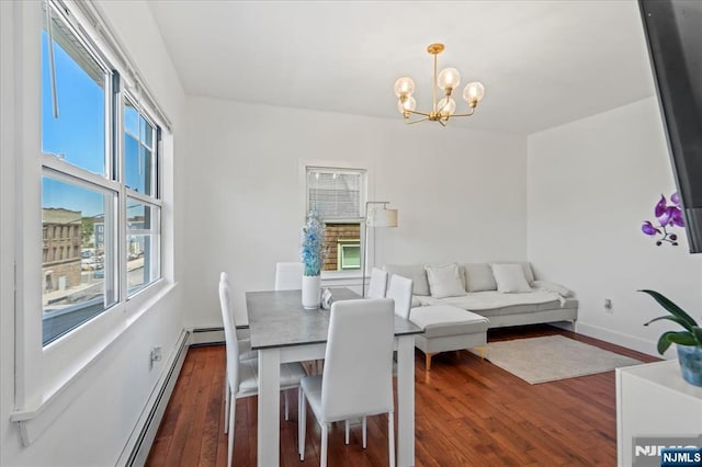 1026 Grove St, Irvington, NJ 07111 - dining room featuring baseboards, dark wood finished floors, and a notable chandelier