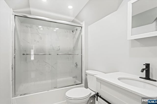 1026 Grove St, Irvington, NJ 07111 - full bath featuring vanity, bath / shower combo with glass door, and toilet