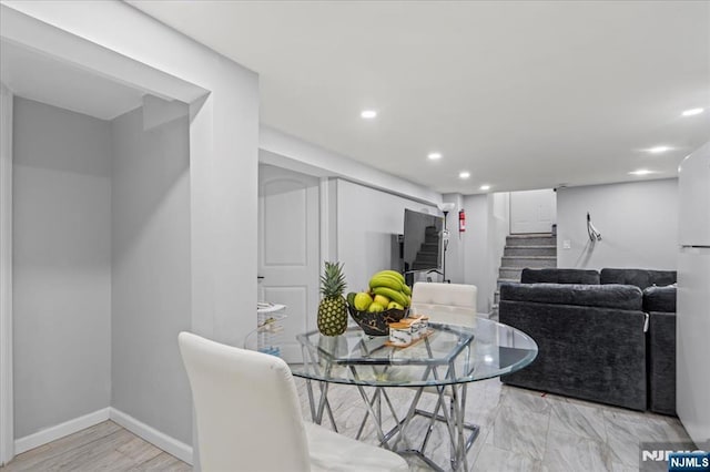 1026 Grove St, Irvington, NJ 07111 - dining room featuring recessed lighting, stairs, and baseboards