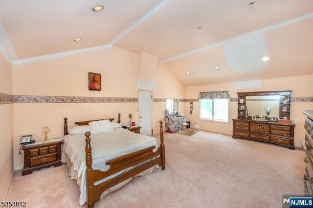 carpeted bedroom featuring recessed lighting and lofted ceiling