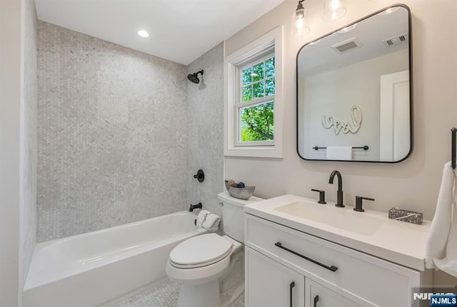 full bath featuring visible vents, bathtub / shower combination, toilet, and vanity