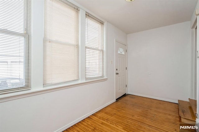 118 W 49th St, Bayonne, NJ 07002 - interior space featuring light wood-style floors and baseboards