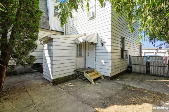 118 W 49th St, Bayonne, NJ 07002 - view of exterior entry with fence and a gate