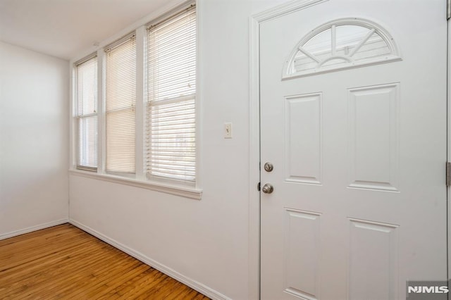 118 W 49th St, Bayonne, NJ 07002 - entrance foyer with light wood-type flooring and baseboards