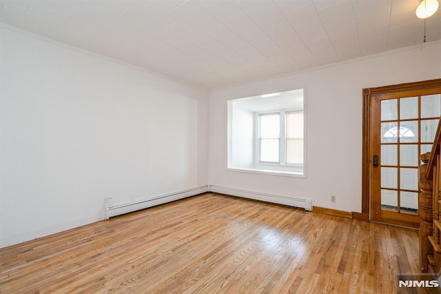 118 W 49th St, Bayonne, NJ 07002 - unfurnished room featuring ornamental molding, wood finished floors, and baseboard heating