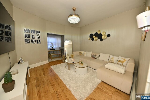 72 Van Winkle Ave, Garfield, NJ 07026 - living room featuring baseboards and hardwood / wood-style flooring