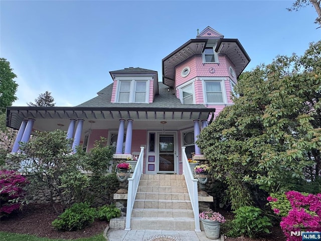 142 Brookfield Ave, Nutley, NJ 07110 - victorian home featuring roof with shingles and a porch