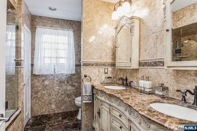 142 Brookfield Ave, Nutley, NJ 07110 - full bathroom featuring toilet, tile walls, a sink, and marble finish floor