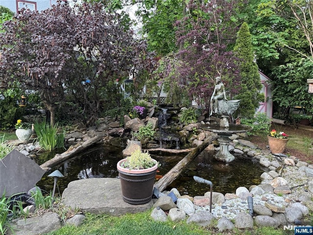 142 Brookfield Ave, Nutley, NJ 07110 - exterior space featuring a small pond