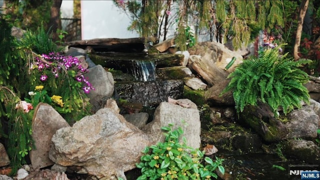 142 Brookfield Ave, Nutley, NJ 07110 - exterior details featuring a small pond
