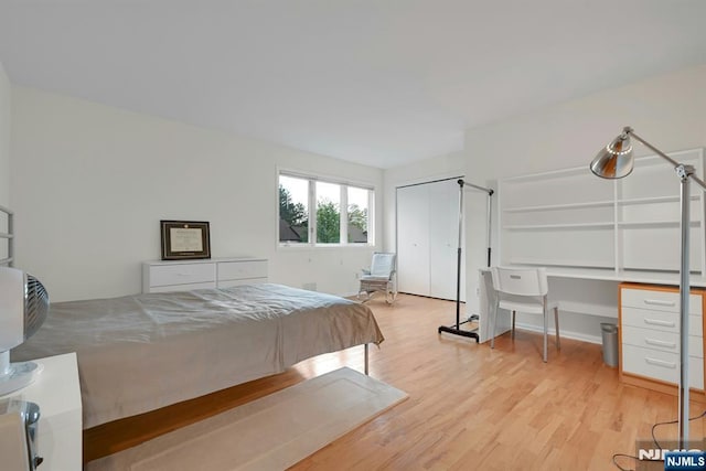 bedroom with light wood-style flooring