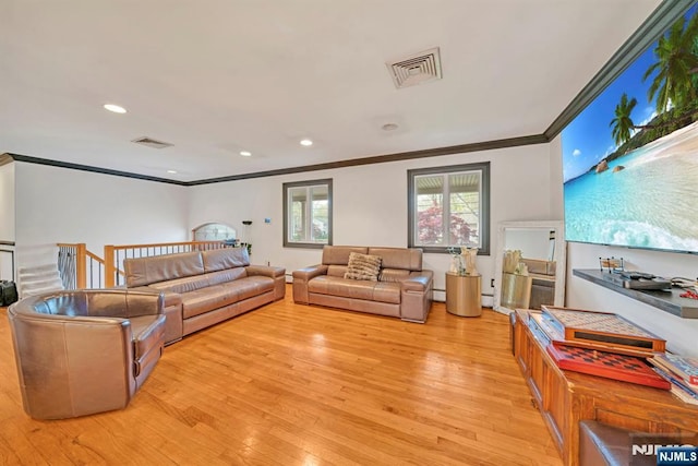 living room featuring crown molding, light wood-style floors, recessed lighting, and visible vents