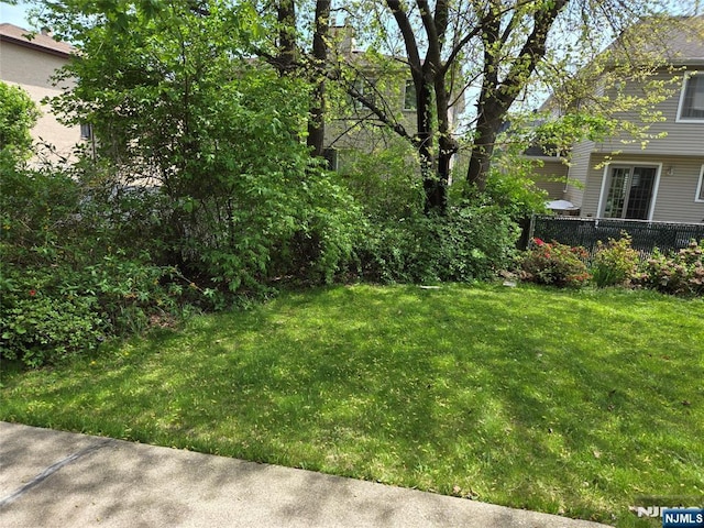view of yard with fence