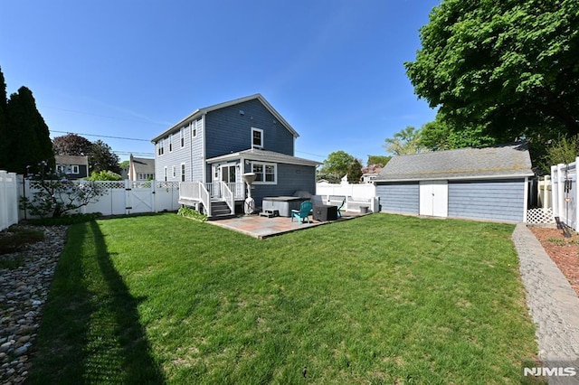 back of property featuring a fenced backyard, a gate, a patio, and a lawn