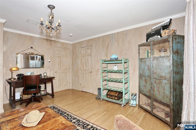 office space featuring a chandelier, wood finished floors, and ornamental molding