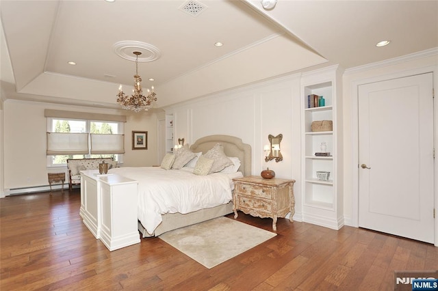 bedroom with a raised ceiling, baseboard heating, a chandelier, hardwood / wood-style floors, and ornamental molding