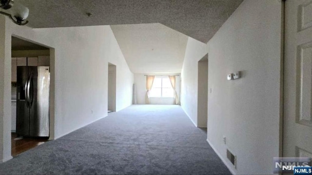 hall featuring carpet