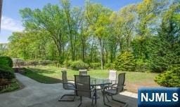 view of patio featuring outdoor dining space