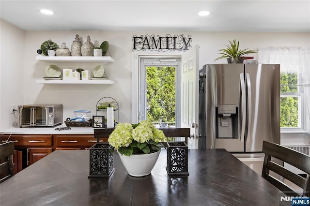dining room featuring recessed lighting