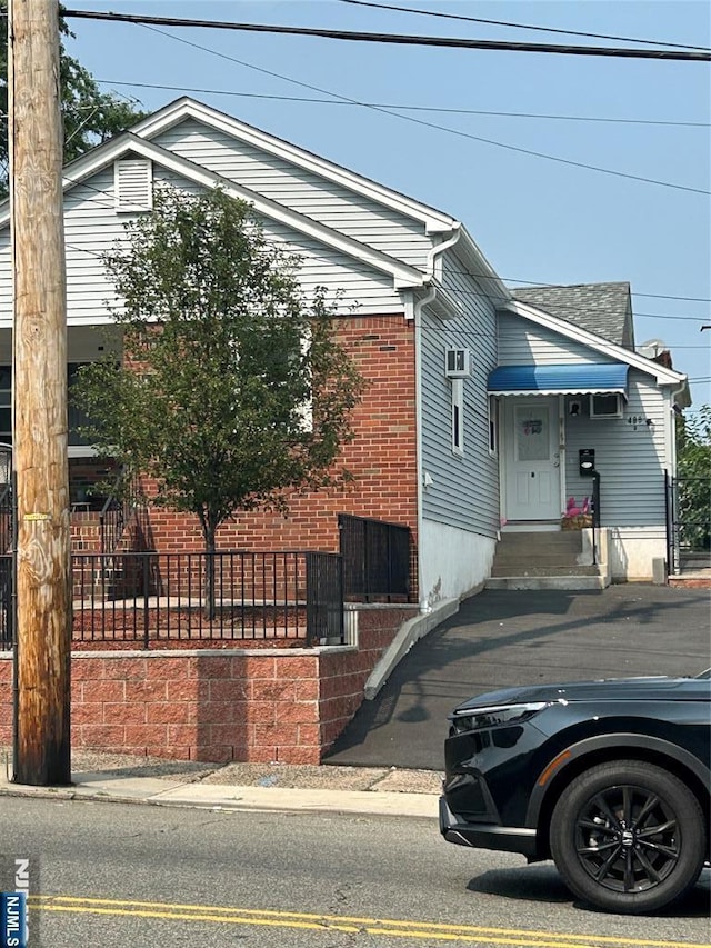 view of front of property with brick siding