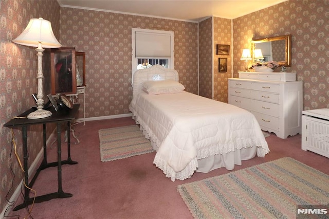 bedroom featuring crown molding, carpet flooring, and wallpapered walls