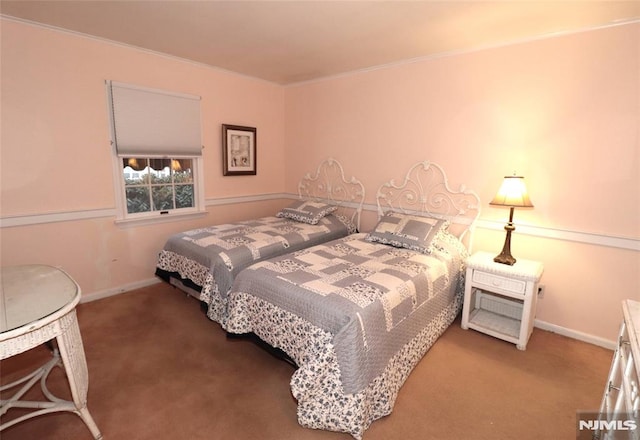 bedroom with baseboards, carpet flooring, and ornamental molding