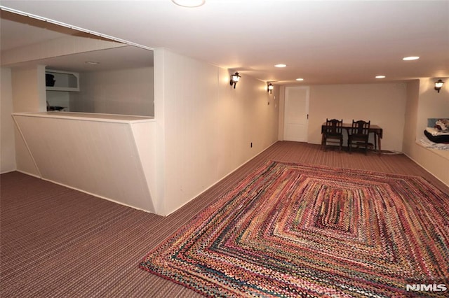 hall featuring carpet floors and recessed lighting