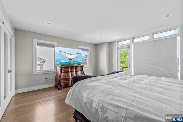 746 Undercliff Unit A, Edgewater, NJ 07020 - bedroom with access to outside, wood finished floors, baseboards, and recessed lighting