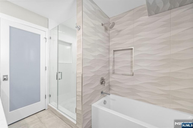 746 Undercliff Unit A, Edgewater, NJ 07020 - bathroom featuring a shower stall, a tub, and tile patterned floors