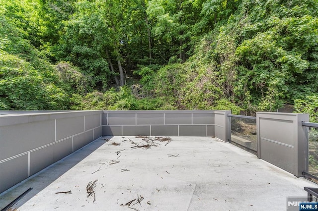746 Undercliff Unit A, Edgewater, NJ 07020 - view of patio with a forest view