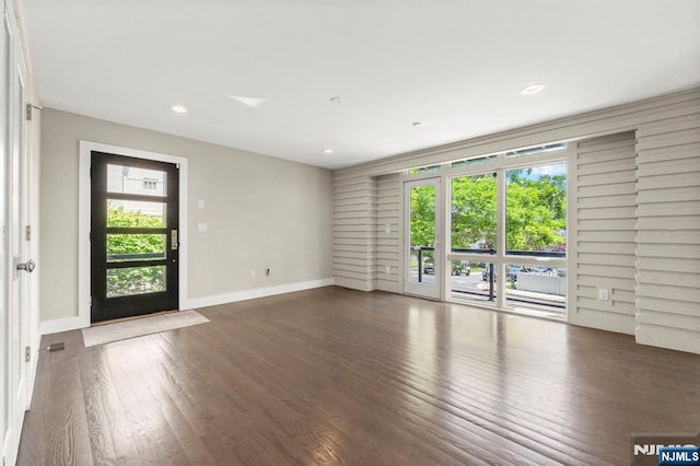 746 Undercliff Unit A, Edgewater, NJ 07020 - unfurnished living room featuring wood finished floors, baseboards, and recessed lighting